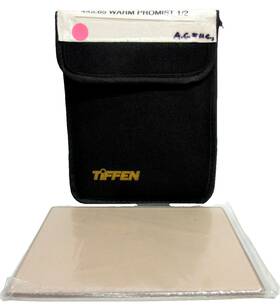 45650wpm12 Tiffen 4x5.65 Inch Warm Promist Glass Filter Density 1/2 Softens Wrinkles Blemishes 45650wpm12 Tiffen 4x5.65 Inch Warm Promist Glass Filter Density 1/2 Softens Wrinkles Blemishes