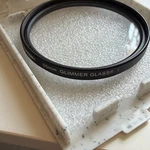 Tiffen 55MM Glimmer Glass 1 - Soft Focus & Diffusion Filters Lightly Used. Fixed Price $50.00.