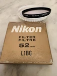 Vintage Nikon 52MM L1BC Skylight Filter - (nos) W Original Box, Case & Pamphlet. Fixed Price $29.95.