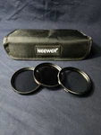 Neewer Circular Polarizer Glass Filter For 50MM Lens W/case. Fixed Price $9.00.