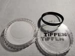 Genuine Tiffen Center-spot 55MM Lens Filter. Fixed Price $14.99.