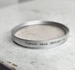 Canon Skylight 1X Filter 58MM Circular Thread - Silver Chrome. Fixed Price $14.99.