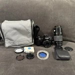 Minolta Maxxum 7000 Af 35MM Film Slr Kit 50MM F/1.7 Lens + 70-210MM F/4 W/bag. Fixed Price $200.00.