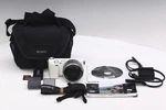 Sony NEX-5T White Camera Bundle 16-50MM Oss Lens, 32GB Sd, Flash, Bag & Cable. Fixed Price $309.00.
