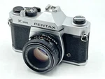 Pentax K1000 35MM Slr Camera Kit W/ 50MM Or 55MM Lens - Very Good. Fixed Price $318.28.