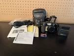Nikon Coolpix 5400 Camera 5MP Flip Screen Charger, Memory Card, Manual, Case. Fixed Price $65.00.