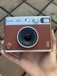 Fujifilm Instax Mini Evo Hybrid Instant Camera Brown. Fixed Price $170.00.