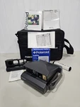 Polaroid Spectra Af Camera With Film Close Up Lens And Case Booklet. Fixed Price $70.95.