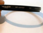 Rocketfish RF-UVF67 67MM Filter Protector. Fixed Price $14.82.
