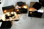 3 Boxes Ollny Solar Lights Model LED4V51 50LEDSTAR 11 Modes 25'. Fixed Price $34.46.