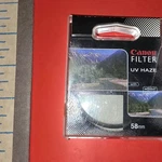 Canon 58MM Uv Haze Filter: Absorbs Ultraviolet Rays, P#7-5801-1 New In Package. Fixed Price $24.00.