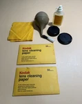 Camera Accessories: Kodak Paper Lens Cleaners, Caps, Brush, Etc. Fixed Price $7.00.