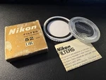 Nikon 52MM L1BC Uv Glass Filter In Box With Manual - Skylight Haze. Fixed Price $16.99.