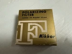 Nikon Nikkor 52MM Polarizing Filter W/ Leather Case Made Japan. Fixed Price $20.00.