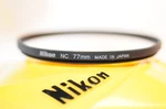Nikon 77MM Nc Neutral Clear Protective Filter For Nikkor 70-200MM Vr 24-70 Lens. Fixed Price $44.84.