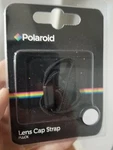 Polaroid Lens Cap Strap. Fixed Price $6.00.