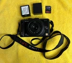 Panasonic Lumix DMC-GF1 Mirrorless Camera With 20MM F/1.7 Lens. Fixed Price $250.00.