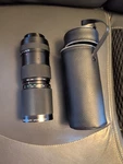 Promaster Auto Zoom 85-210MM Camera Lens 1:4.8 No. 377848. Fixed Price $25.00.