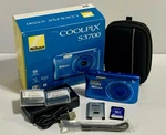 In-box Nikon Coolpix S3700 Compact Digital Camera 20.1MP 8X Zoom 16GB Sd & More. Fixed Price $157.12.