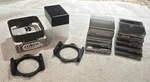 Cokin Series Modular Hood A255 W/ Holder Rings & Assorted Square Filters. Fixed Price $32.50.