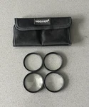 Neewer Macro Close Up Lens Filter Kit (+1,2,4,10). Fixed Price $19.00.