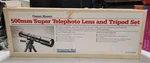 Vintage 500MM Super Telephoto Lens And Tripod Set Montgomery Ward Bshelf. Fixed Price $95.00.