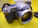 Panasonic Lumix DMC-FZ7 Digital Bridge Camera Silver + Strap Battery. Fixed Price $46.98.