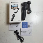 Dji Osmo Mobile 7P DA100 Black Built-in Tripod Smartphone Camera Stabilizer. Fixed Price $69.99.