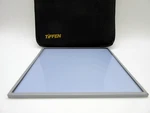 Tiffen 6.6X6.6" Light Balancing Glass Filter Mfr #666682A. Fixed Price $300.00.